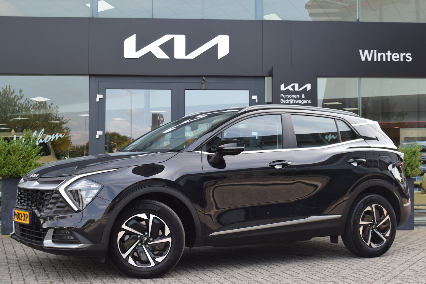 Kia Sportage - 1.6 T-GDi Hybrid DynamicLine | Adaptive Cruise | Camera | Climate | Navigatie | Apple Carp - AutoWereld.nl