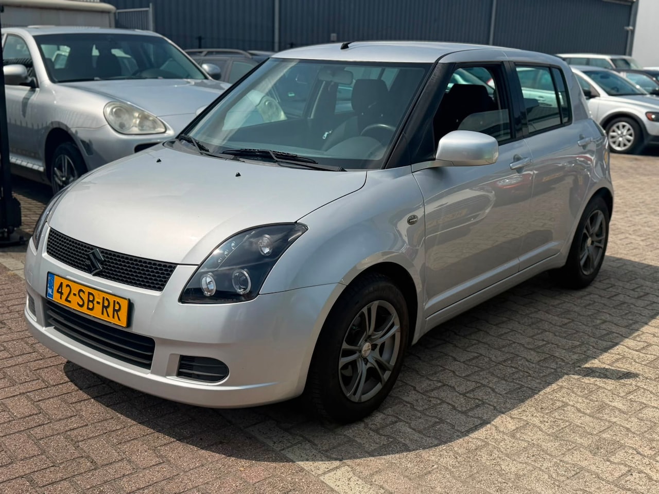 Suzuki Swift - 1.3 GLS Grijs 5-Deurs LMV APK 01-2027 - AutoWereld.nl