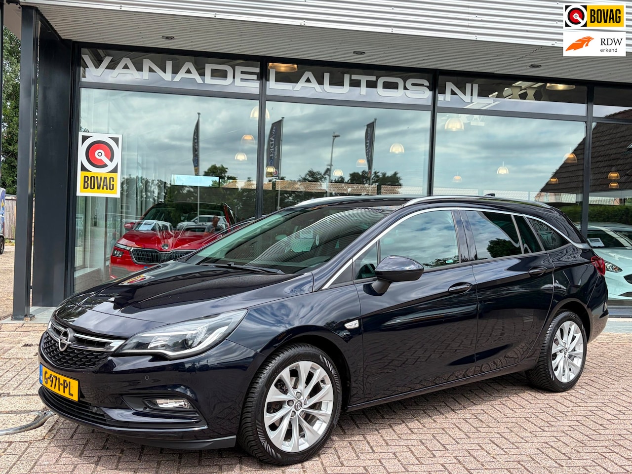 Opel Astra Sports Tourer - 1.4 Innovation Leer Navi Camera Cruise LED Dealeronderhouden! - AutoWereld.nl