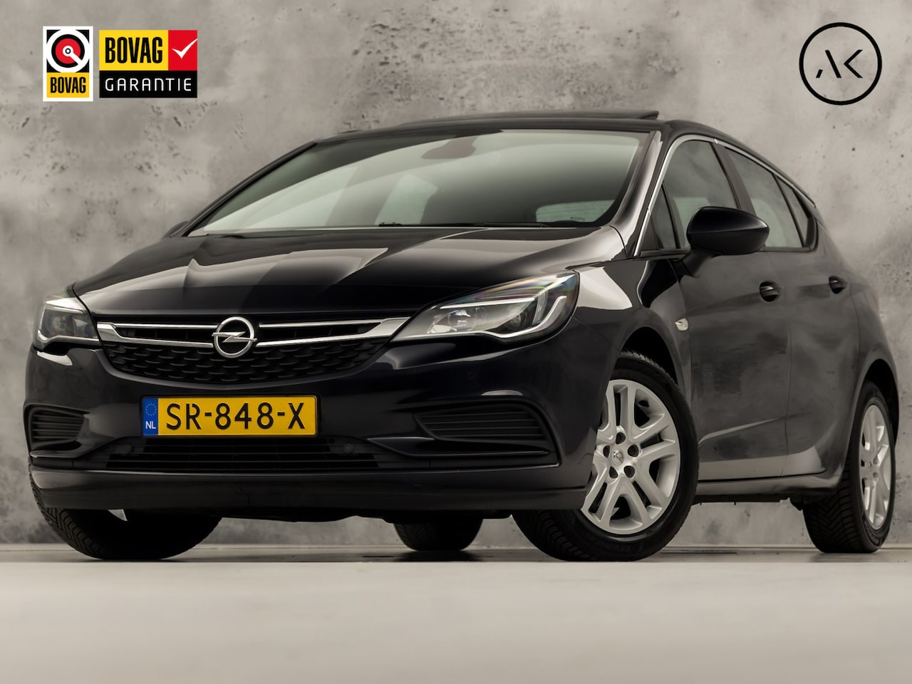 Opel Astra - 1.4 Turbo Sport 150Pk (SCHUIFDAK, APPLE CARPLAY, GROOT NAVI, CLIMATE, CAMERA, SPORTSTOELEN - AutoWereld.nl