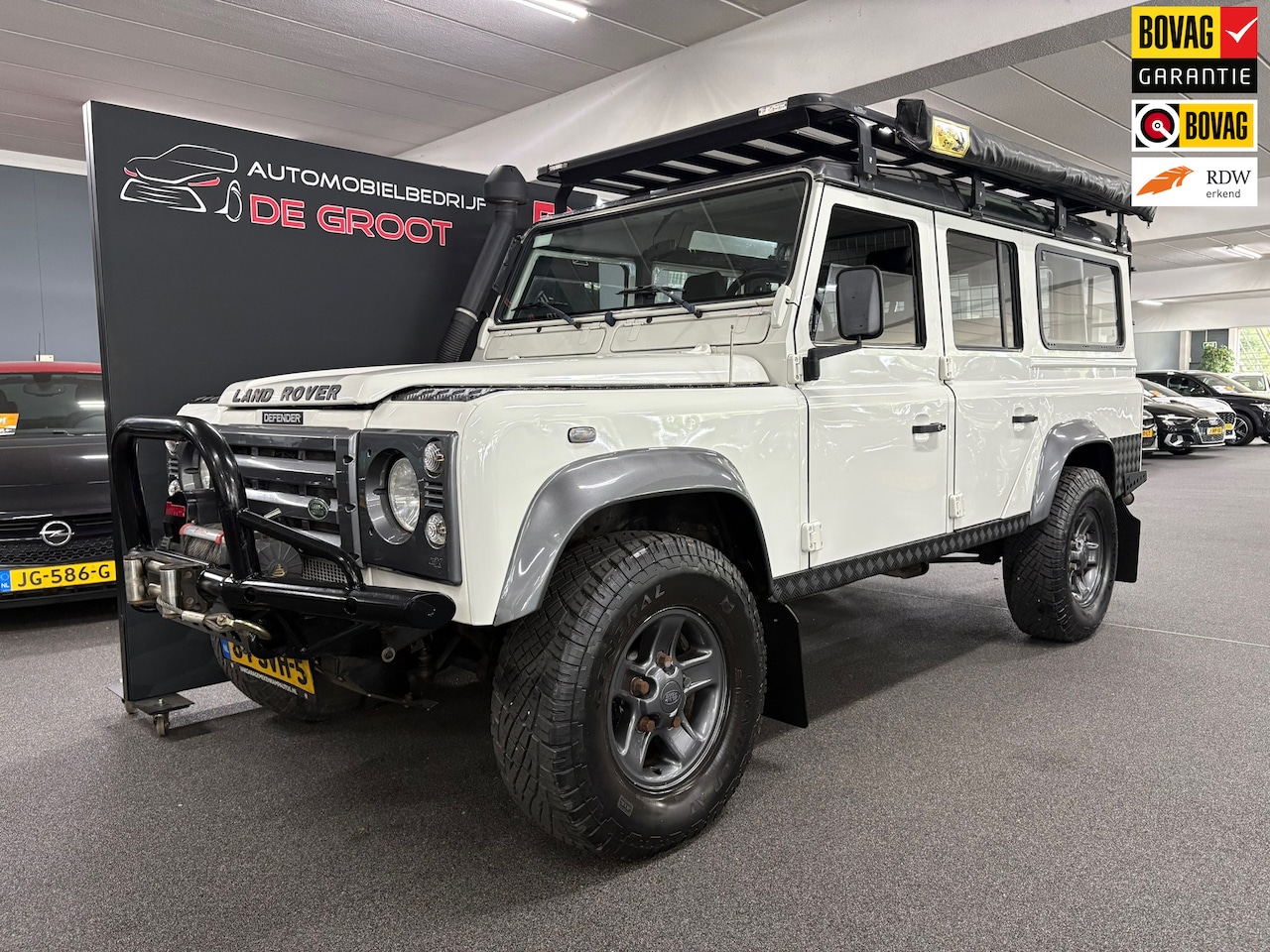 Land Rover Defender 110 - 2.5 TD5 SW S/ Trekhaak/ 9 persoons/ Lederen bekleding - AutoWereld.nl