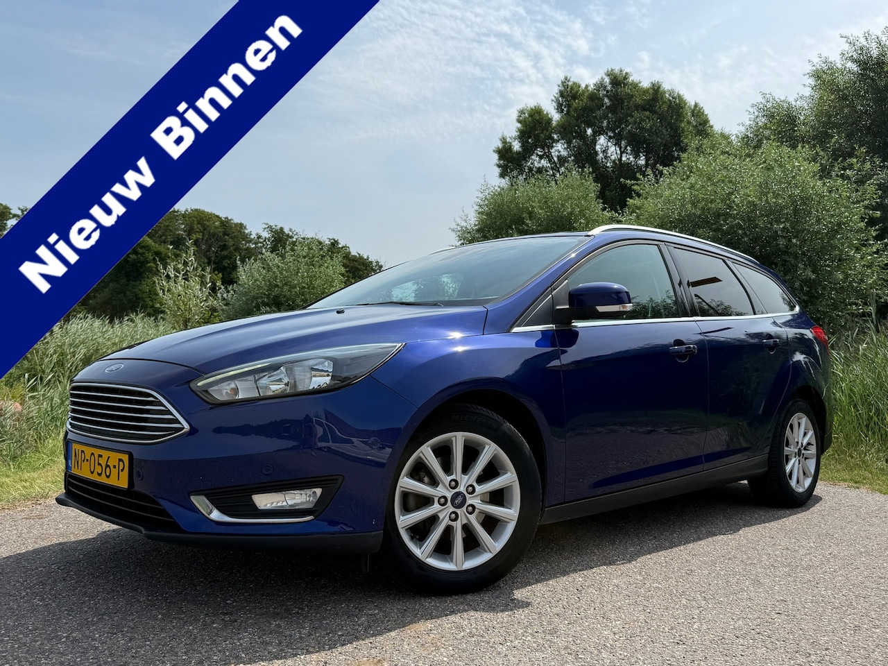 Ford Focus Wagon - 1.0 Titanium | 1e Eigenaar | Apple CarPlay/Android Auto | Trekhaak | Navi | Clima | 16" Ve - AutoWereld.nl