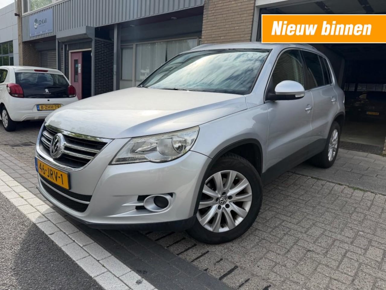 Volkswagen Tiguan - 2.0 TSI SportenStyle 4Motion NETTE AUTO RIJDT PRIMA DISTR VV. NAP APK 3-2027 - AutoWereld.nl