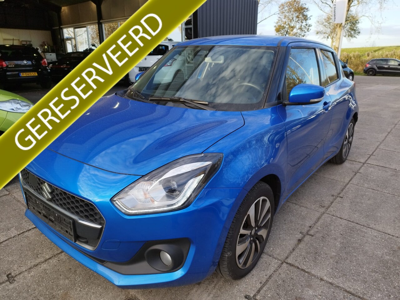 Suzuki Swift - 1.0 Boosterjet 110 PK ** Smart Hybrid NAVI ** Cruise ** Bluetooth ** Lm velgen ** - AutoWereld.nl