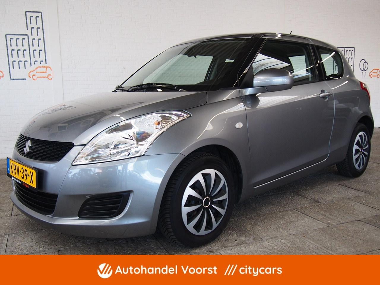 Suzuki Swift - 1.2 Comfort EASSS Airco (APK:Nieuw) Incl.Garantie - AutoWereld.nl