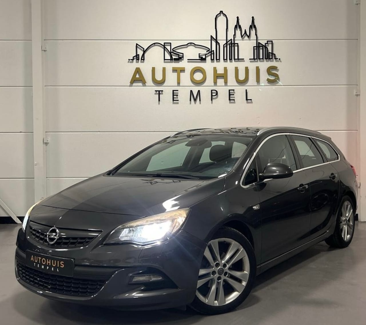 Opel Astra Sports Tourer - 1.4 Turbo Sport Nap Airco Cruise Parkeersensoren Navi Nwe Apk - AutoWereld.nl
