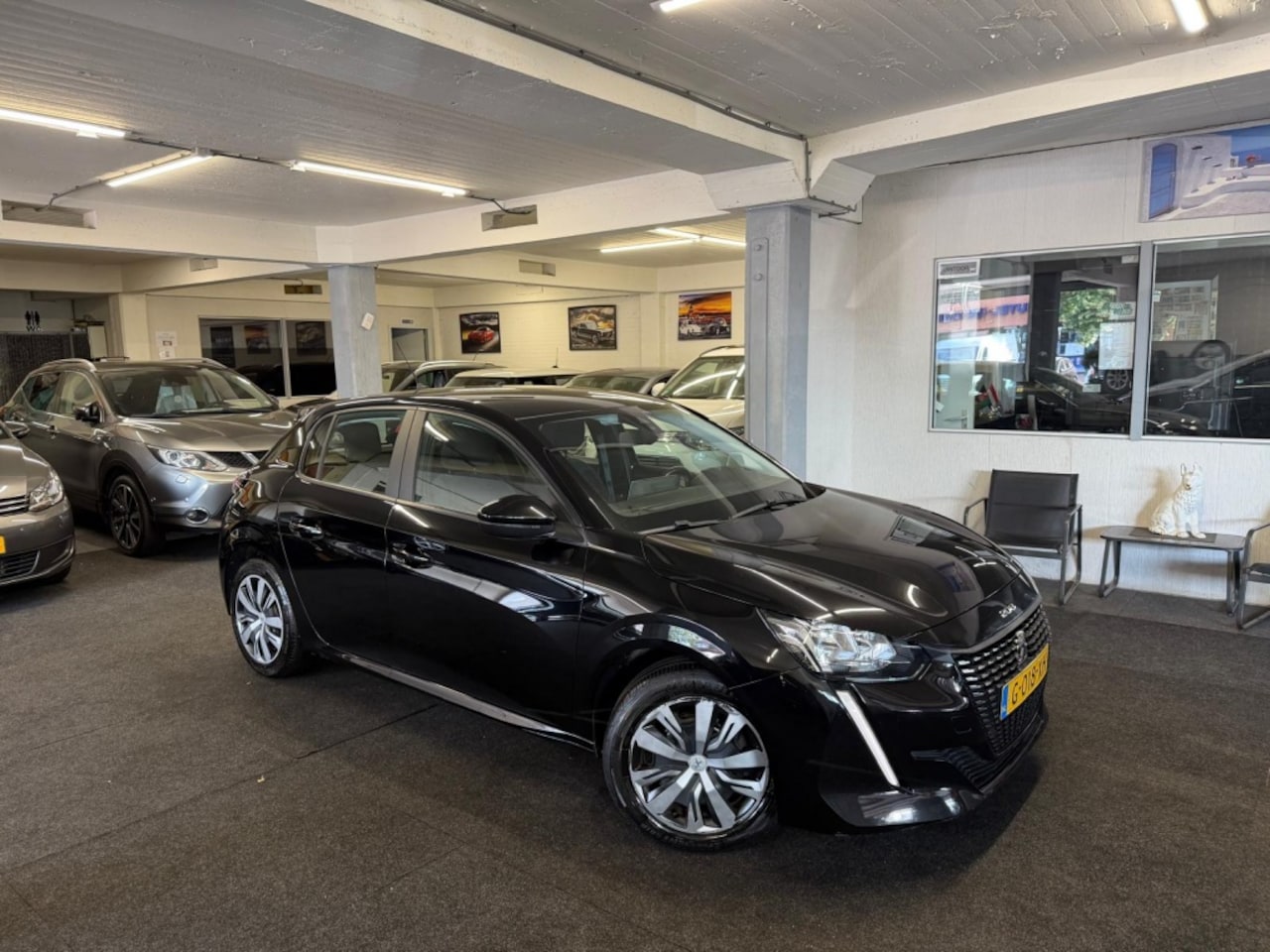 Peugeot 208 - 1.2 PT*Carplay*Camera*led*Navi - AutoWereld.nl