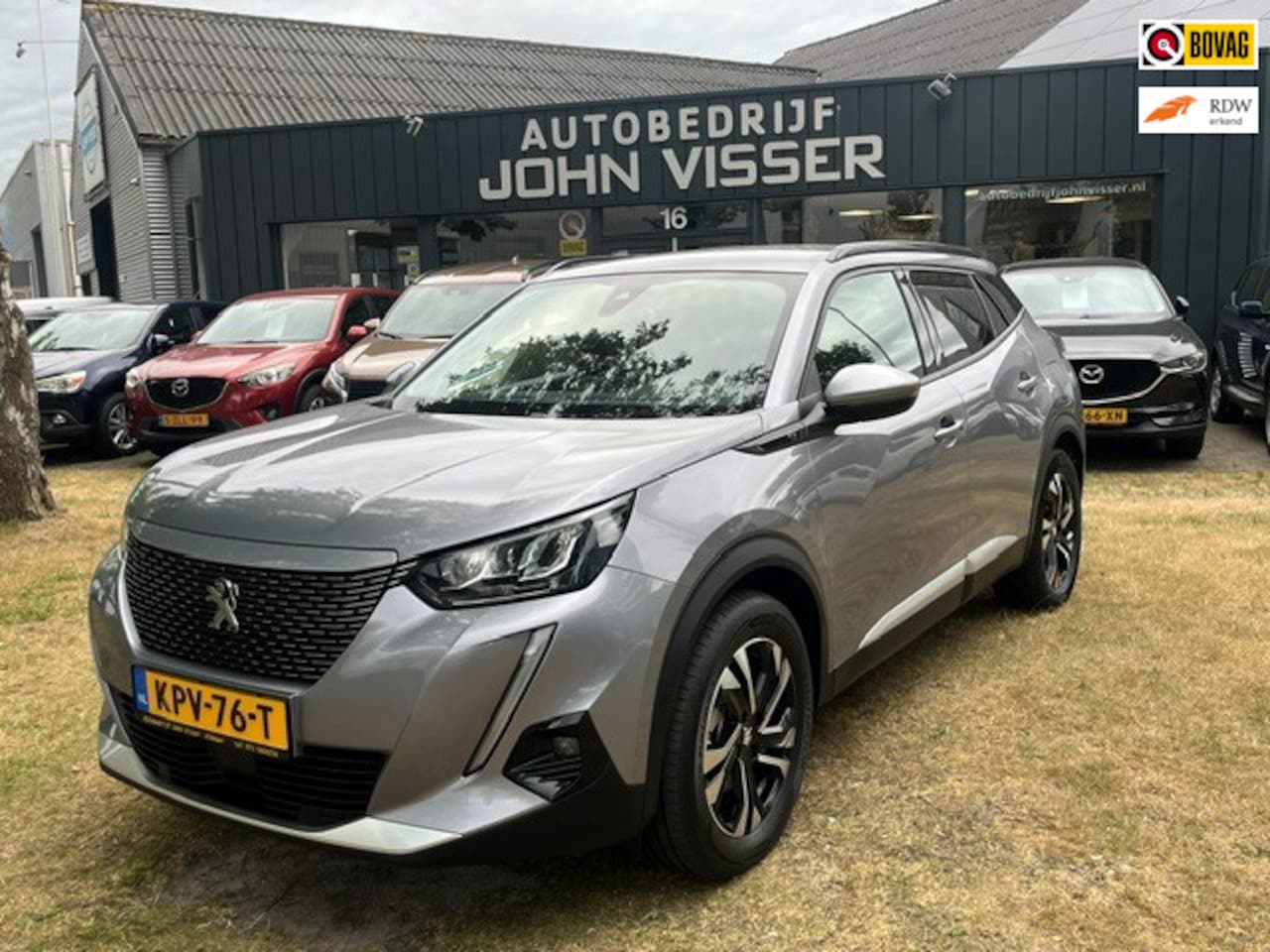 Peugeot e-2008 - EV Allure 50 kWh * full electric * accu SOH 93,16% * Android Auto * Mirror Link * Airco * - AutoWereld.nl