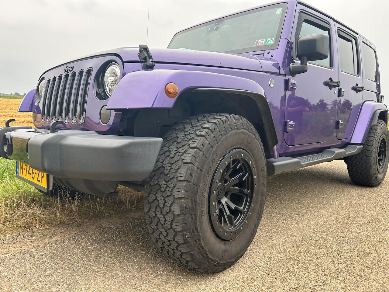 Jeep Wrangler Unlimited - ZELDZAME VERSCHIJNING: Jeep Wrangler Unlimited Sahara 3.6 V6 JKU (2018), Dual Top! - AutoWereld.nl