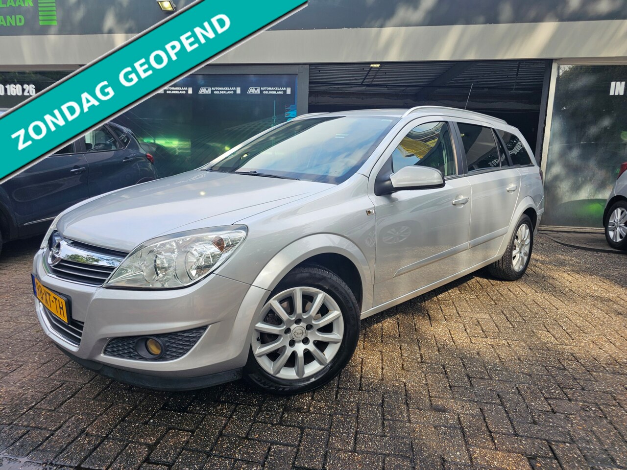 Opel Astra Wagon - 1.6 Cosmo | 1E EIGENAAR | 3/6 OF 12MND GARANTIE | LEER | CRUISE| NAVI | STOELVERWARMING | - AutoWereld.nl
