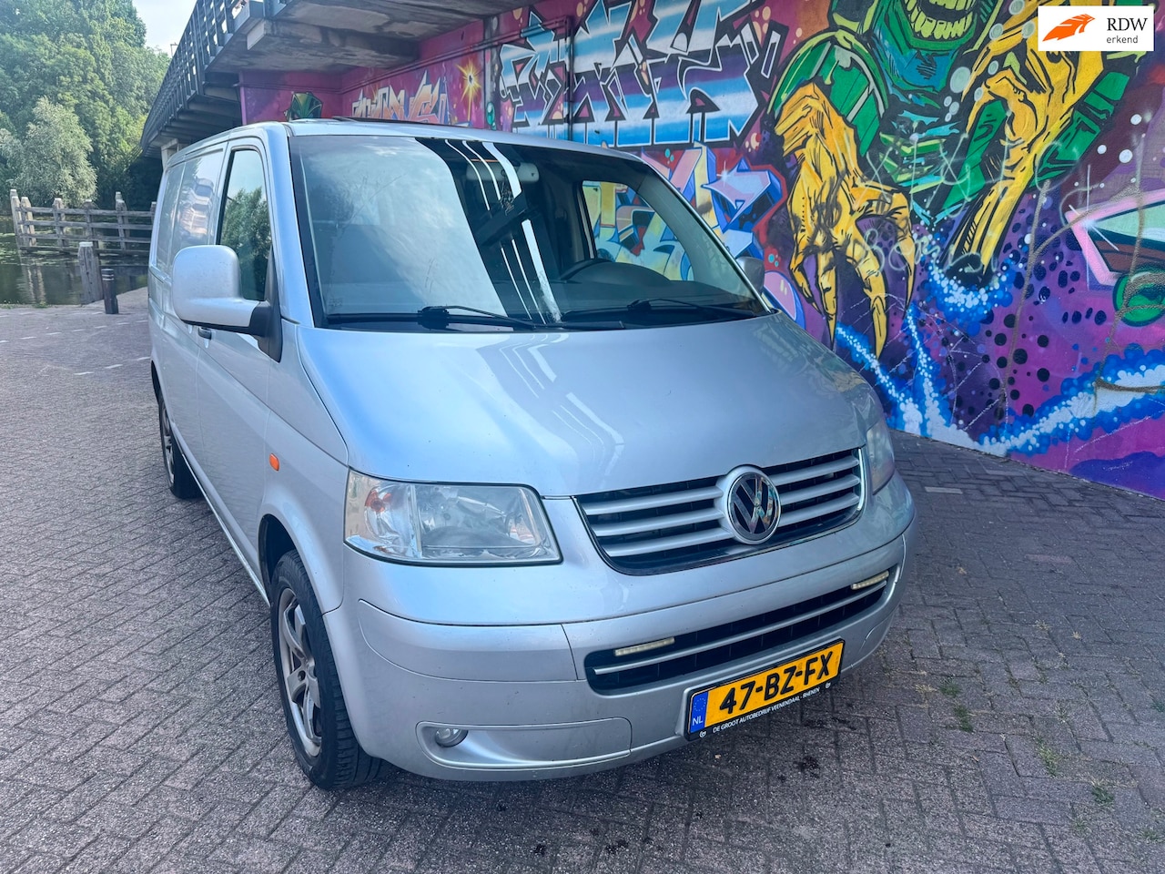 Volkswagen Transporter - 2.5 TDI 300 174 pk schuifdak sport velgen stereo navigatie airco. Zeer mooie goede bestelb - AutoWereld.nl