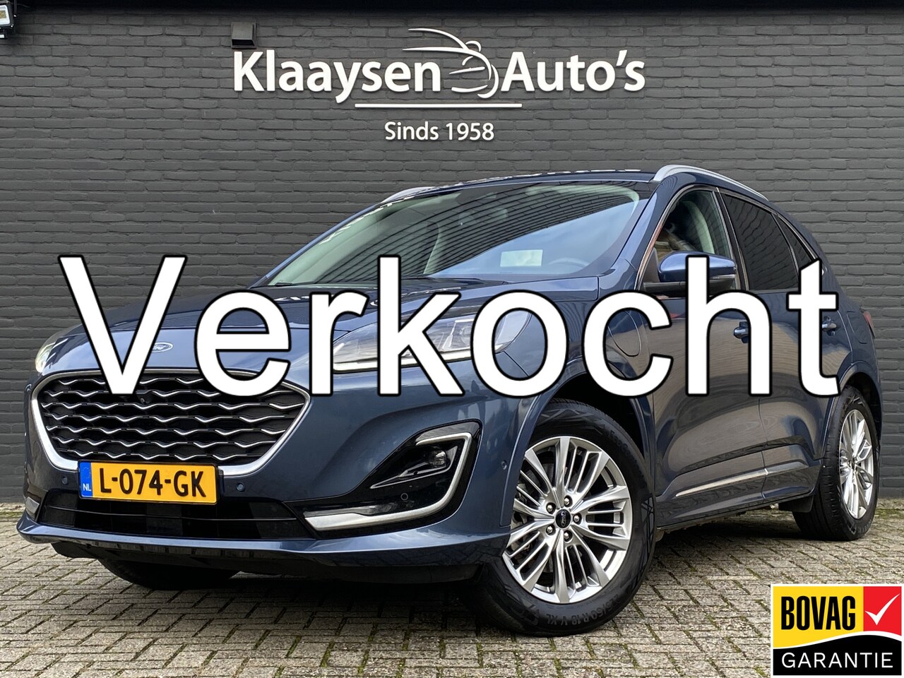 Ford Kuga - 2.5 PHEV Vignale 225 pk AUT. | 1e eigenaar | navigatie | leder interieur | winterpakket | - AutoWereld.nl