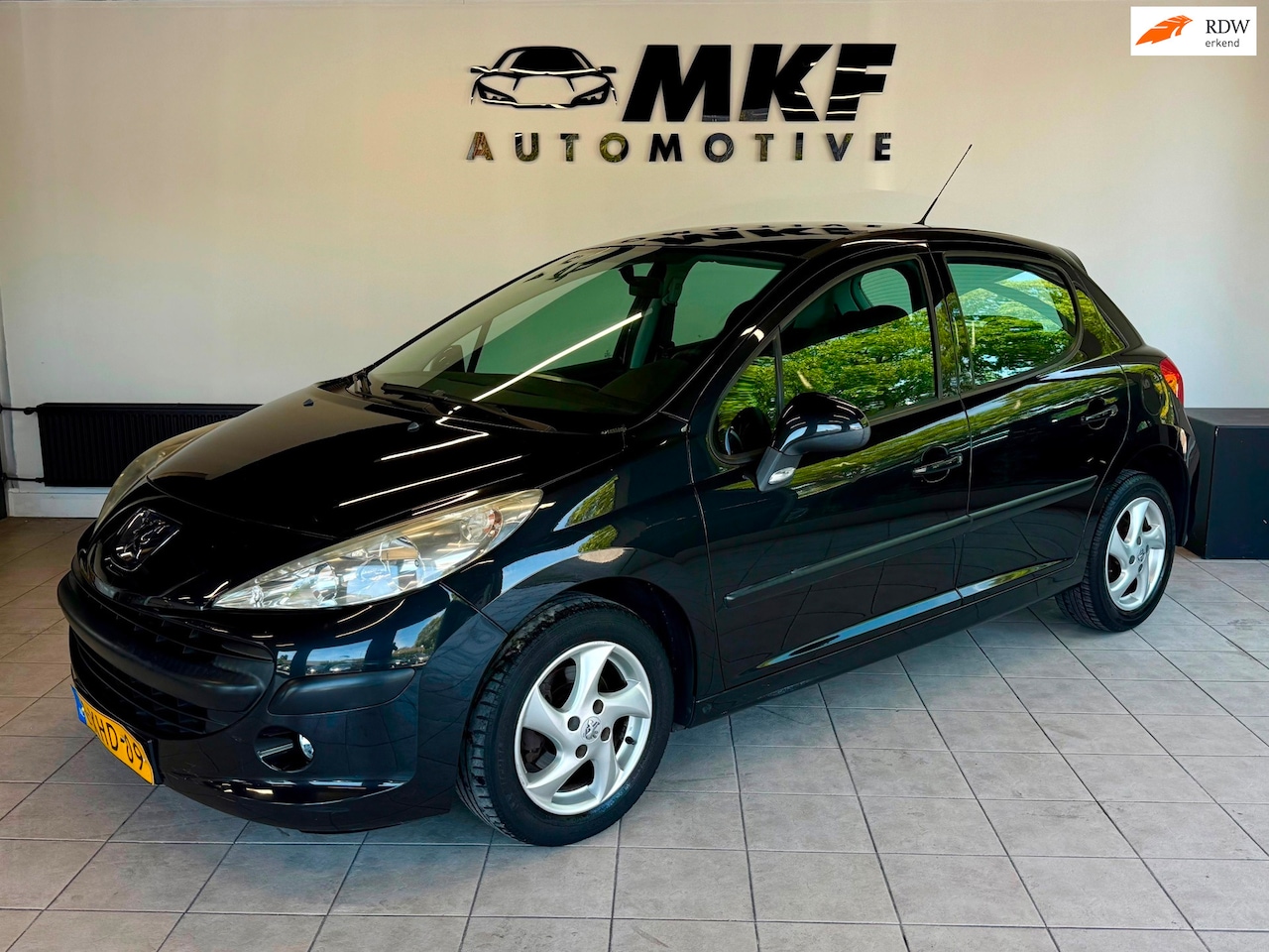 Peugeot 207 - 1.4 Look 5DR 2009 Zwart Airco/Elektr Pakket/LMV! - AutoWereld.nl