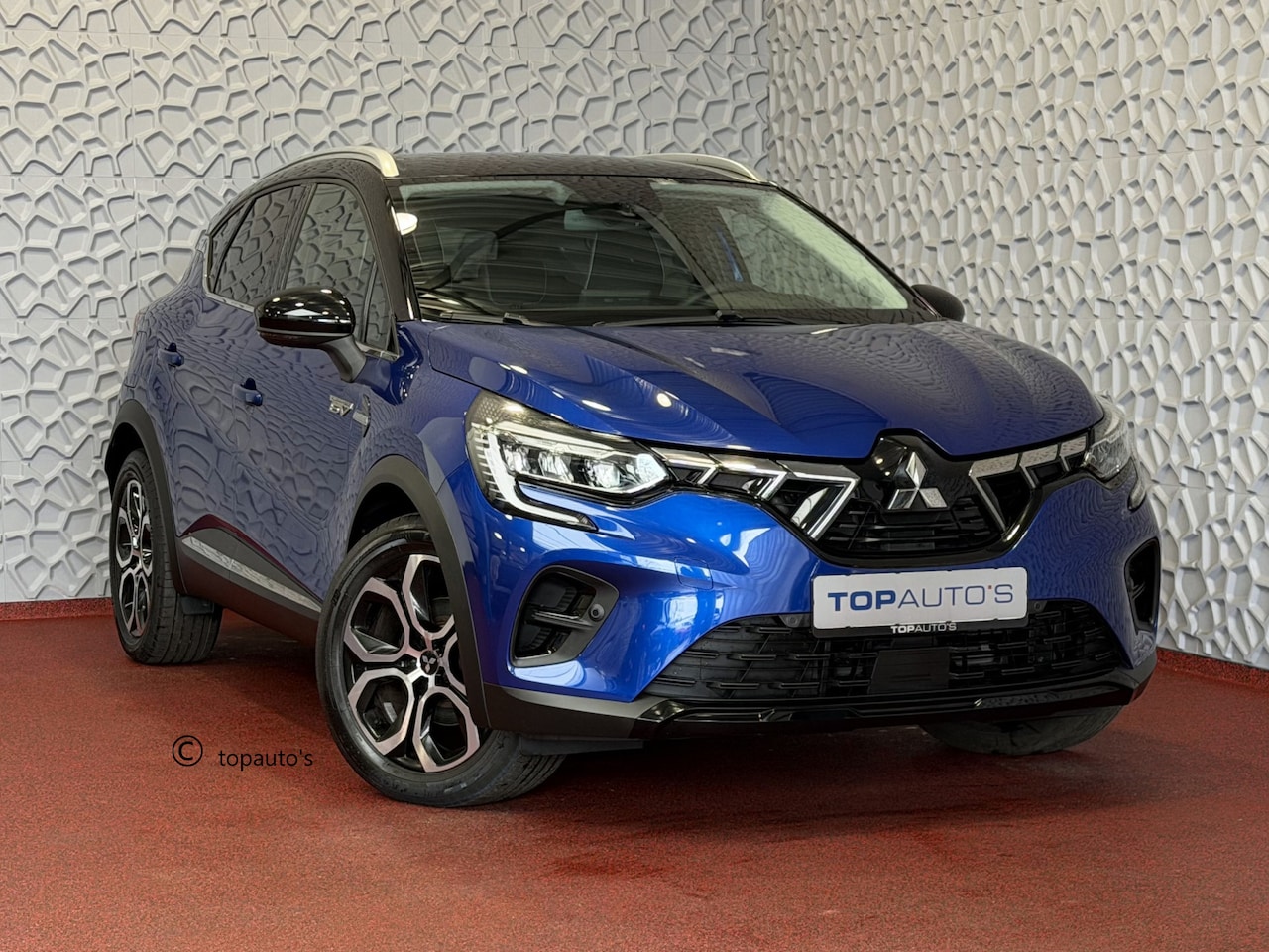 Renault Captur - PLUG IN HYBRID BENZINE EN 60KM ELEKTRISCH 1.6 PHEV AT INTENSE+ NW AUTO / CAMERA / NAVI LED - AutoWereld.nl