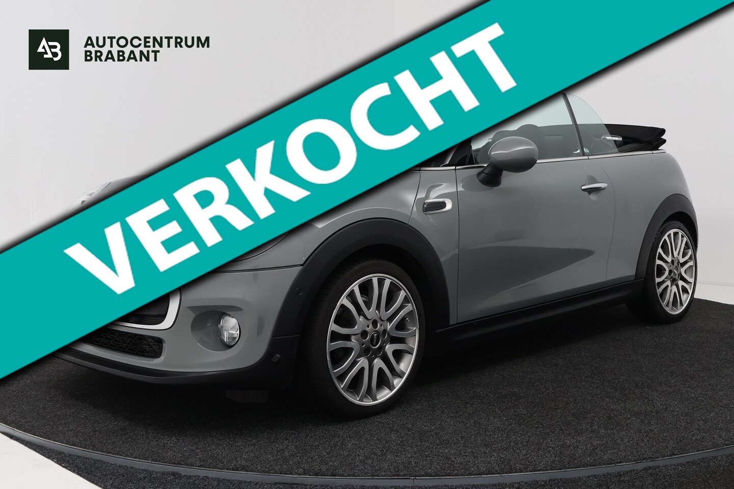 MINI Cabrio - 1.5 Cooper Pepper Serious Business (STOELVERWARMING, NAVIGATIE, CRUISE CONTROL, PARKEERSEN - AutoWereld.nl