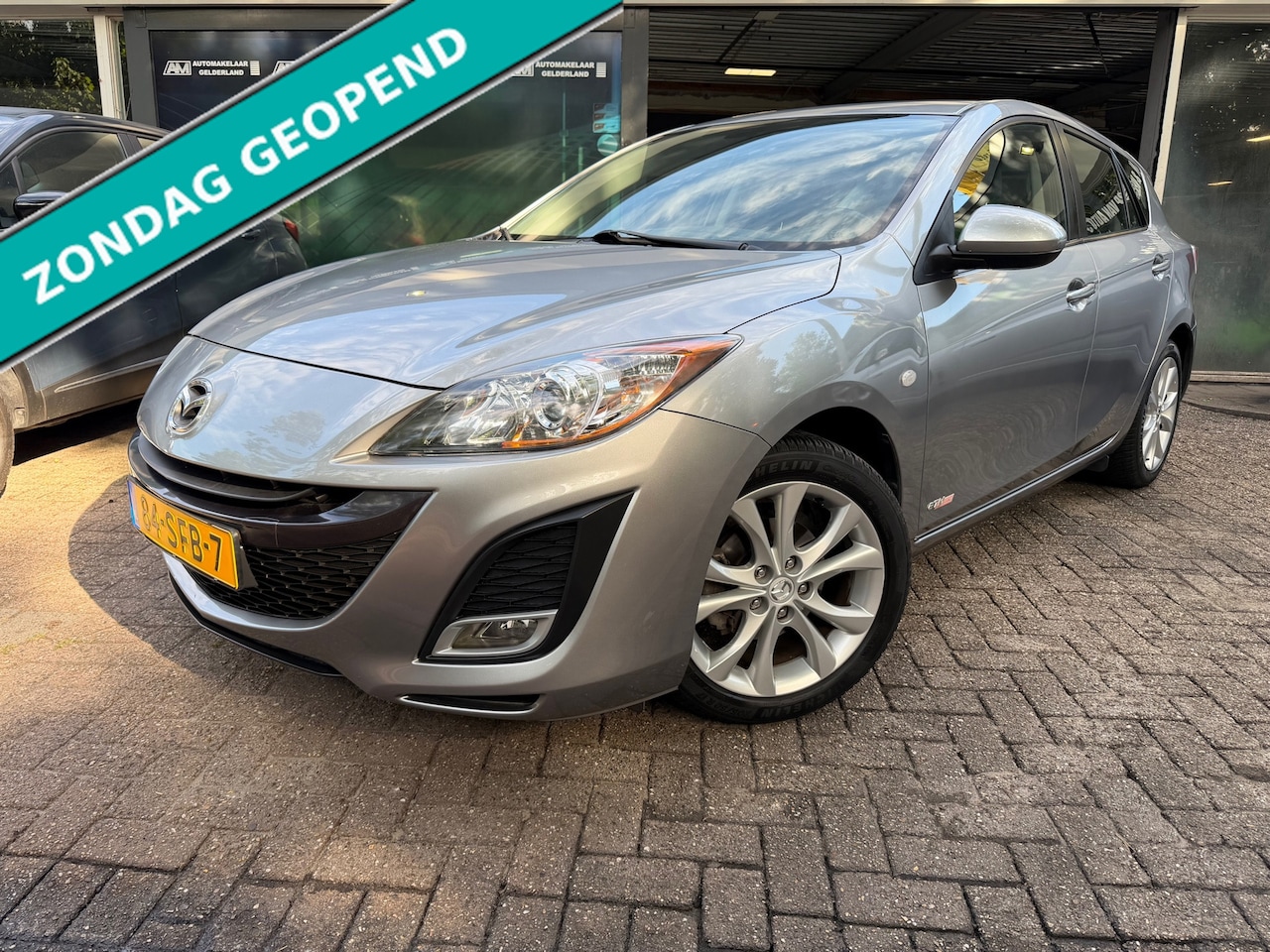Mazda 3 - 1.6 GT-M Line | 1E EIGENAAR |3/6 OF 12 MND GARANTIE | AIRCO | CRUISE | NW APK | - AutoWereld.nl