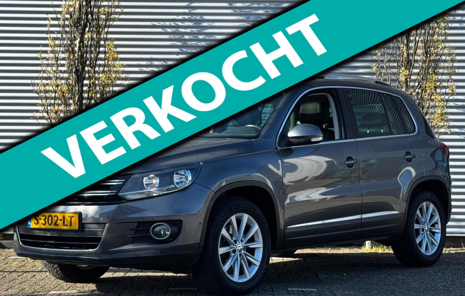 Volkswagen Tiguan - 1.4 TSI Sport&Style R-line Edition - AutoWereld.nl