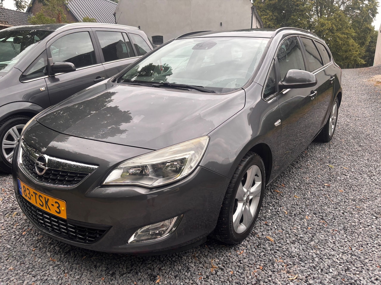 Opel Astra Sports Tourer - 1.4 Turbo Edition AIRCO NAVIGATIE - AutoWereld.nl