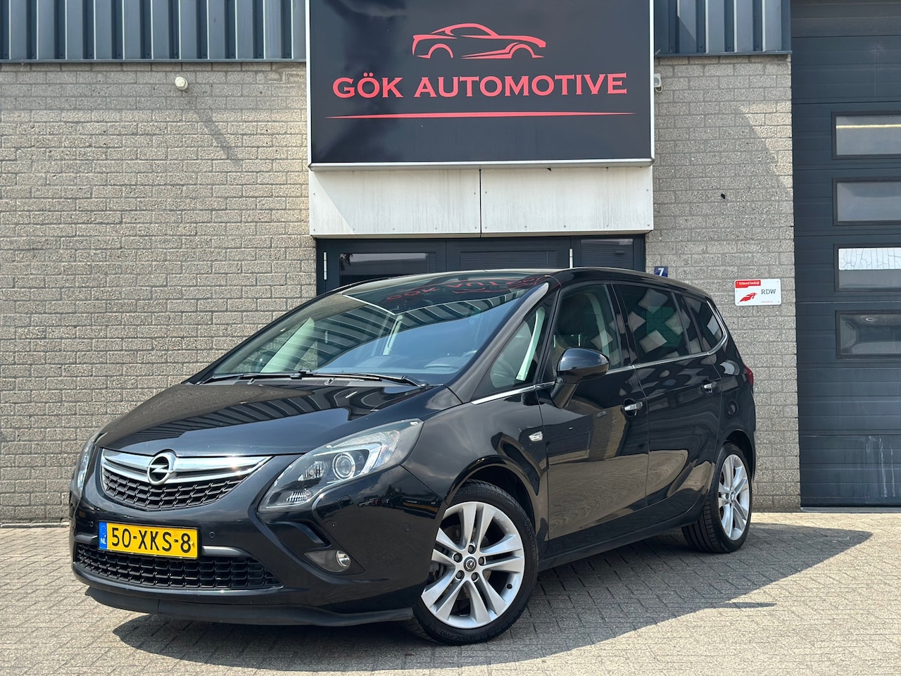 Opel Zafira Tourer - 1.4 Cosmo / Automaat / Panorama dak / Dodehoek / PDC / NWE APK / Fietsendrager / Navi - AutoWereld.nl
