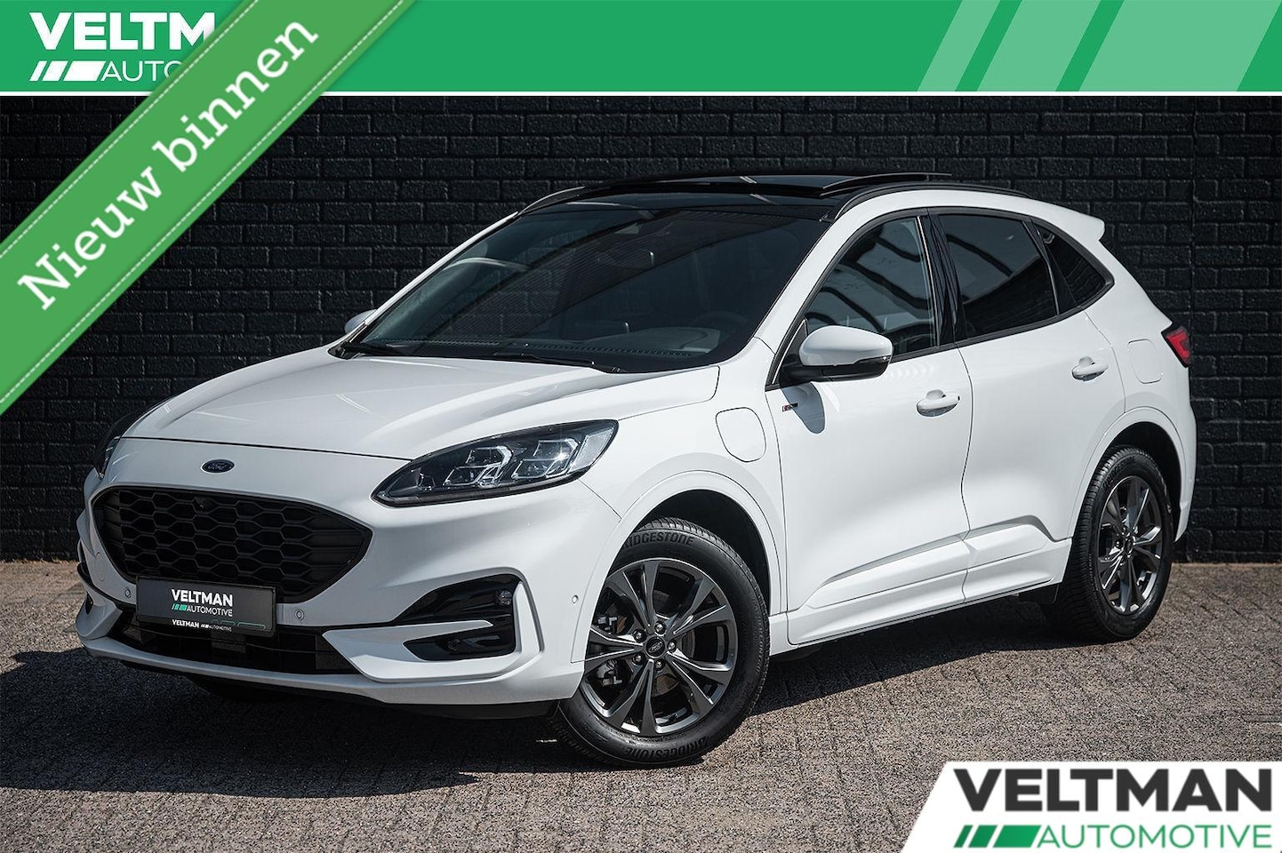 Ford Kuga - 2.5 PHEV ST-Line X PANO TREKHAAK ADAPTIVE CRUISE CAMERA STUURVERWARMING B&O - AutoWereld.nl