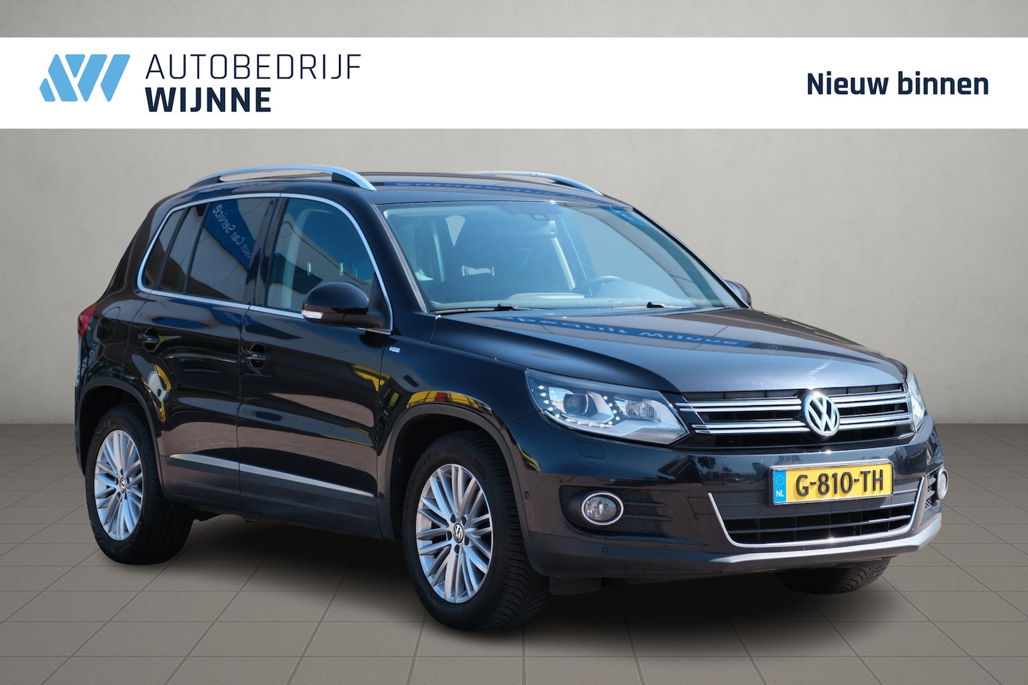 Volkswagen Tiguan - 1.4 TSi 160pk Sport&Style | Navi | Winterpakket | Trekhaak | Climate | Camera | Cruise - AutoWereld.nl