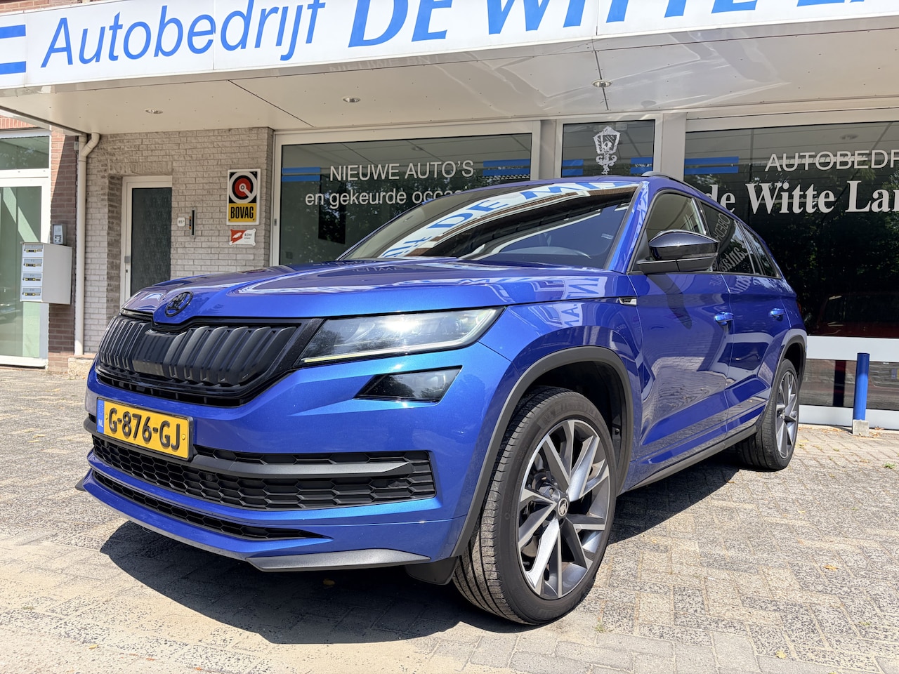Skoda Kodiaq - 2.0 TSI 4x4 Sportline Business VEEL EXTRA/S Panorama dak/Elktr. airco/Lederen alcantara be - AutoWereld.nl