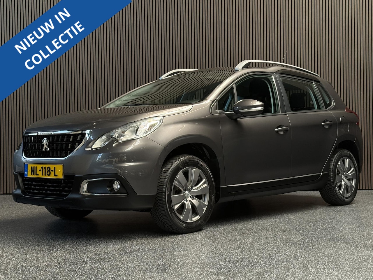 Peugeot 2008 - 1.2 PureTech Blue Lion | Panorama | Carplay | Riem v.v. - AutoWereld.nl