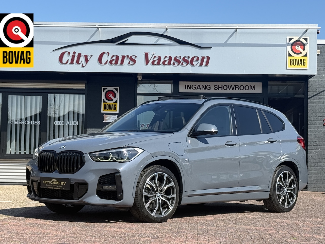 BMW X1 - xDrive25e M sport plug-in hybride full options soh 86.9% pano navi climate ctr M spoiler p - AutoWereld.nl