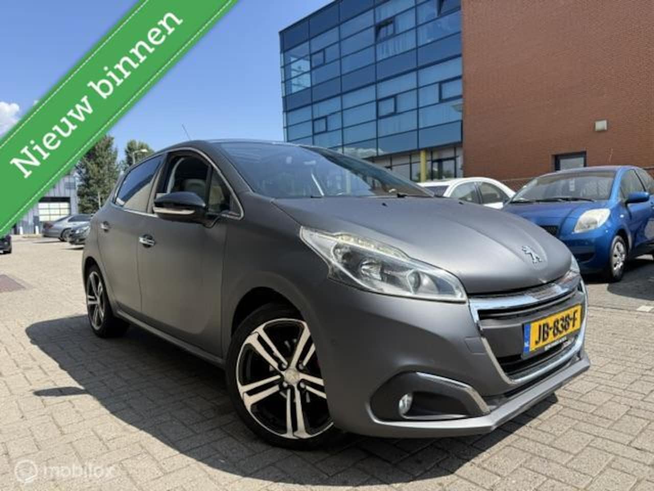 Peugeot 208 - 1.2 Benz GT Line Pano Camera - AutoWereld.nl