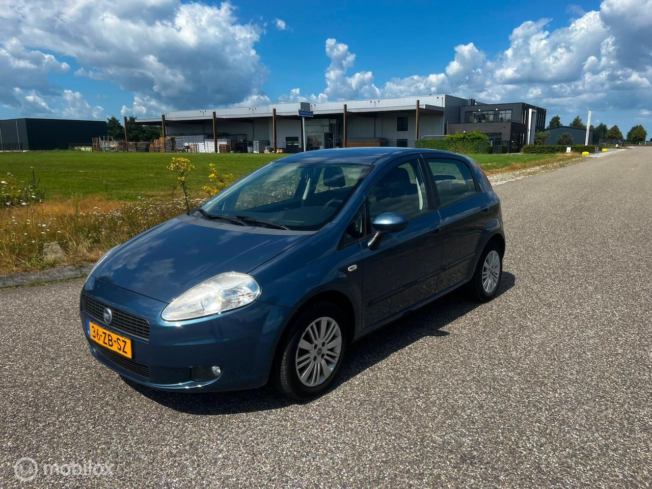 Fiat Grande Punto - 1.4 Airco / Cruise / 5 deurs / APK / NAP - AutoWereld.nl