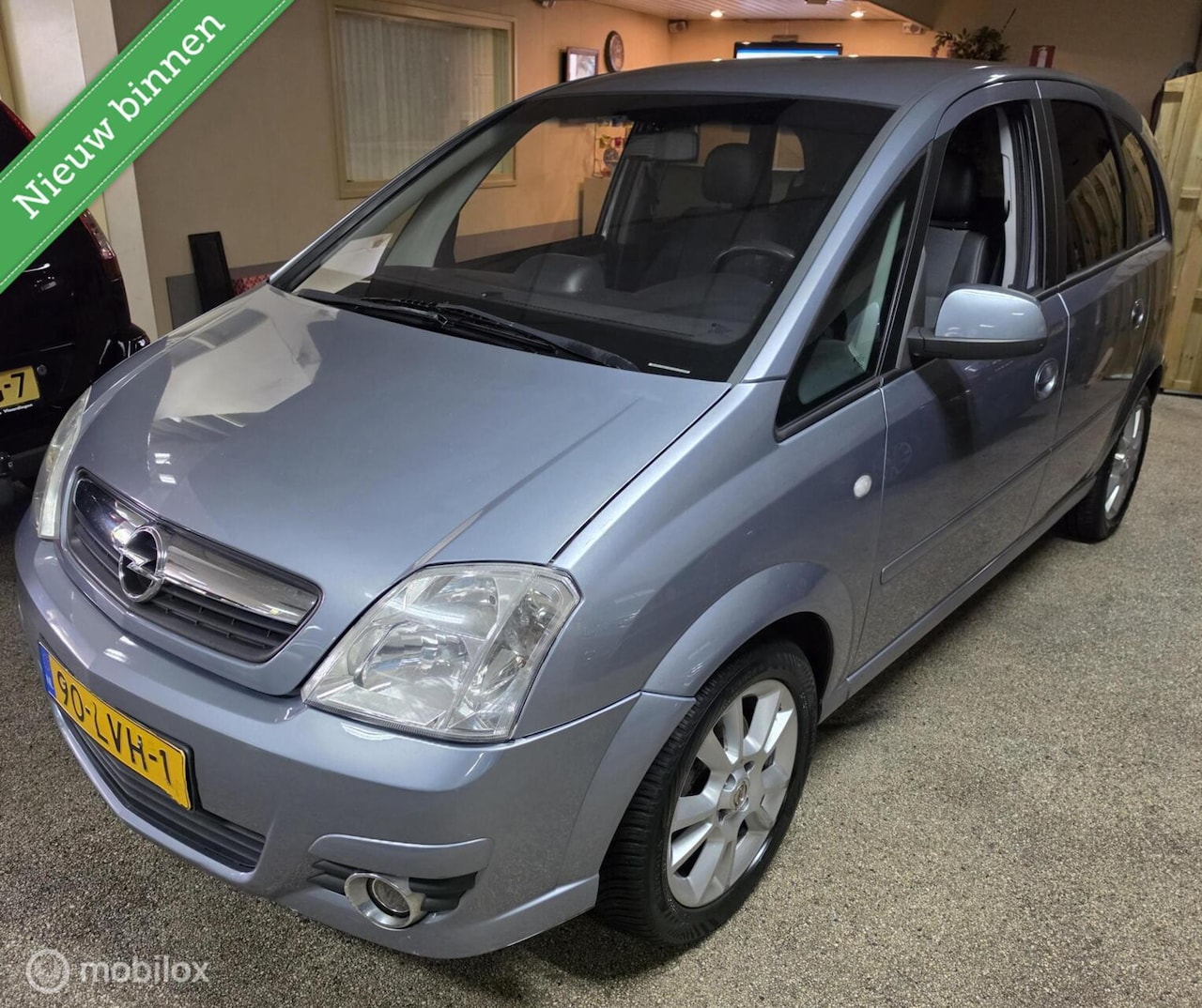 Opel Meriva - 1.6-16V Cosmo Airco, Leder, Navi. - AutoWereld.nl