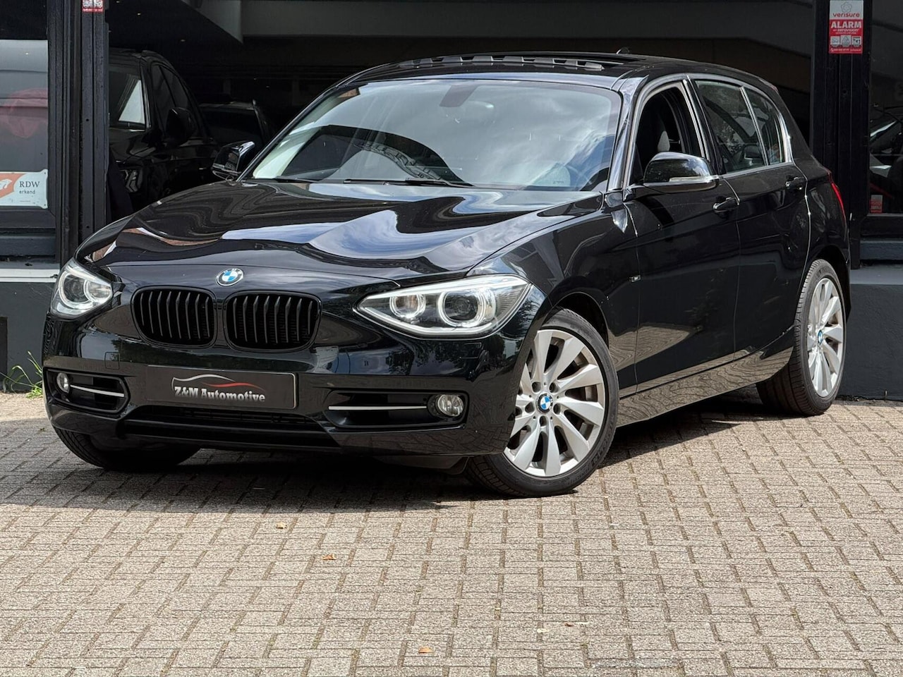 BMW 1-serie - 118i High Executive M-Sport Aut*Xenon*Schuifdak* - AutoWereld.nl
