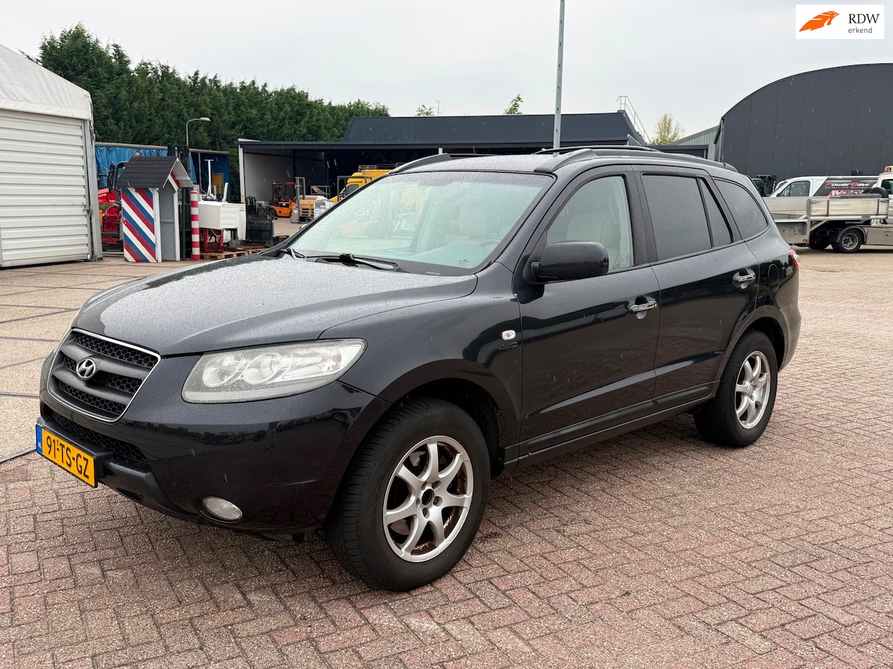 Hyundai Santa Fe - 2.7i V6 4WD Style 7p. leder/airco vol opties - AutoWereld.nl