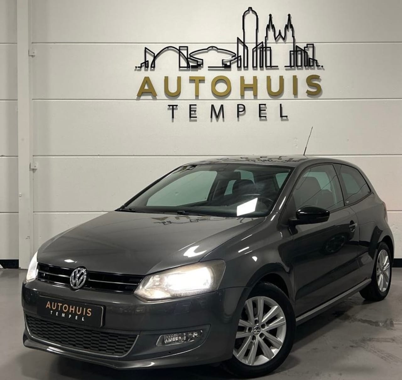 Volkswagen Polo - 1.2-12V BlueMotion Comfortline Style Airco Stoelverwarming Isofix 15Inch - AutoWereld.nl
