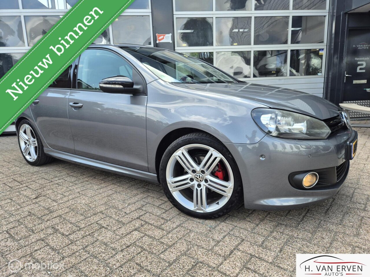 Volkswagen Golf - 1.2 Highline SCHUIFKANTELDAK XENON PDC 18" - AutoWereld.nl