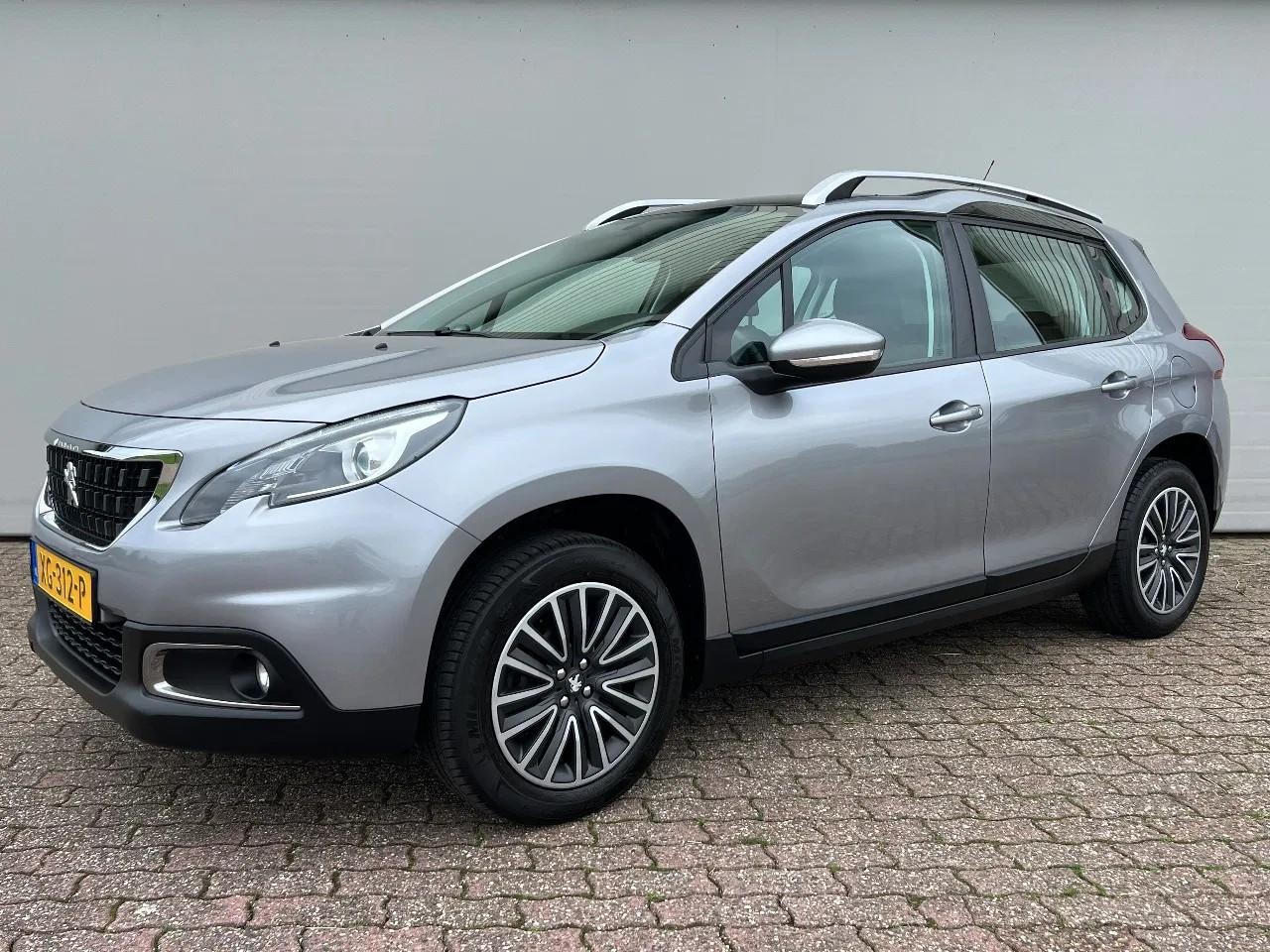 Peugeot 2008 - 1.2 PureTech | NL auto | Panoramadak | Trekhaak | Nieuwstaat! - AutoWereld.nl