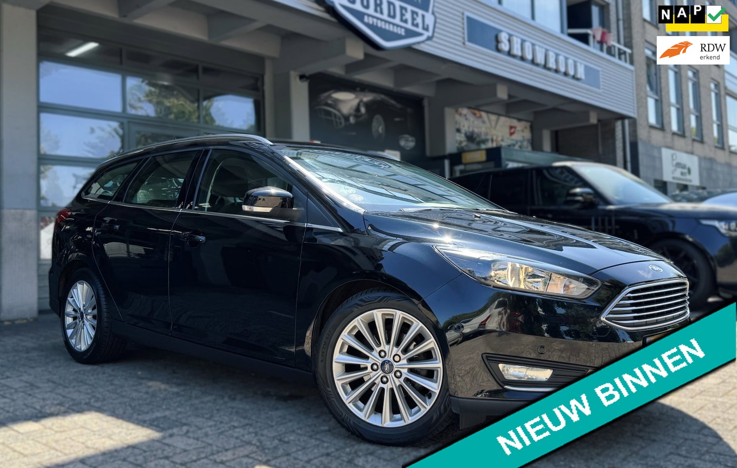 Ford Focus Wagon - 1.0 Titanium Edition | NAVI | AIRCO | CRUISE | TREKHAAK | PDC | NAP | APK. - AutoWereld.nl