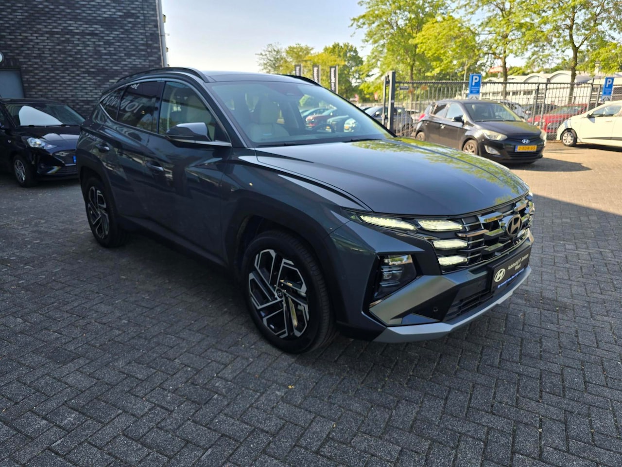 Hyundai Tucson - 1.6 T-GDI HEV Premium 1.6 T-GDI HEV Premium - AutoWereld.nl