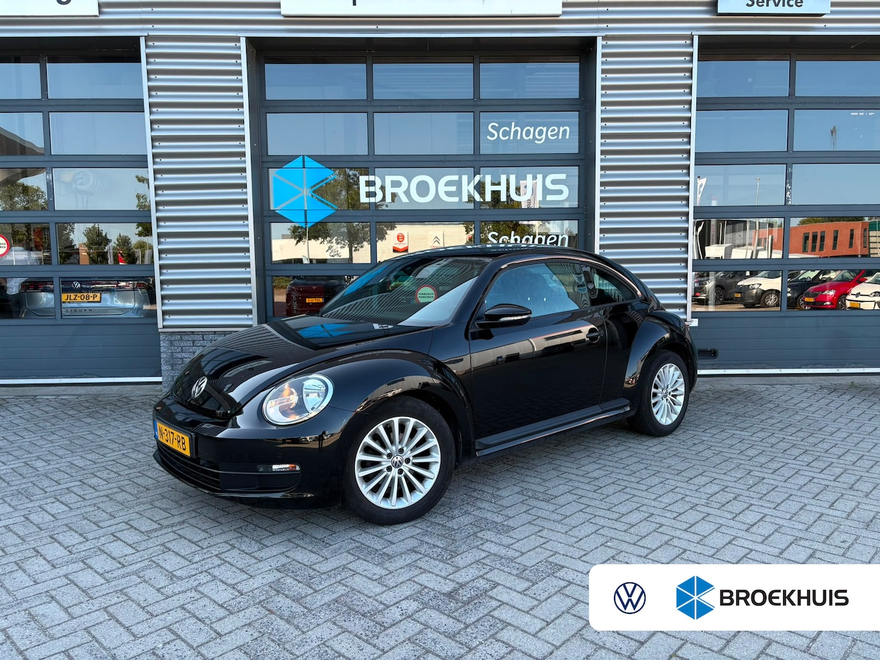 Volkswagen Beetle - 1.2 TSI 105 pk Design | Airco | Navigatie | Stoelverwarming | - AutoWereld.nl