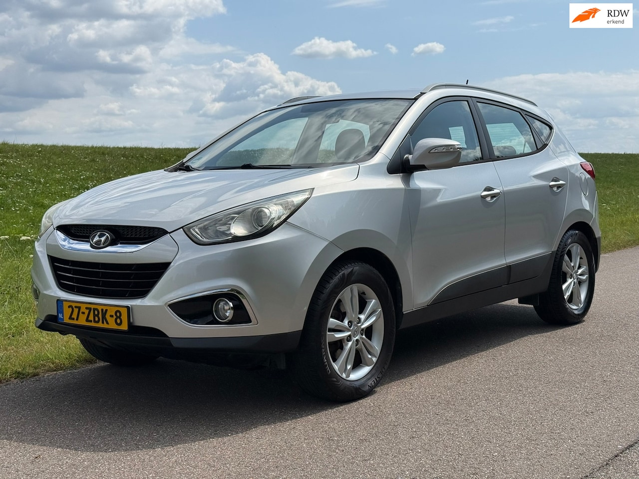 Hyundai ix35 - 2.0i Business Edition | Automaat | Trekhaak | Navigatie | Leder - AutoWereld.nl