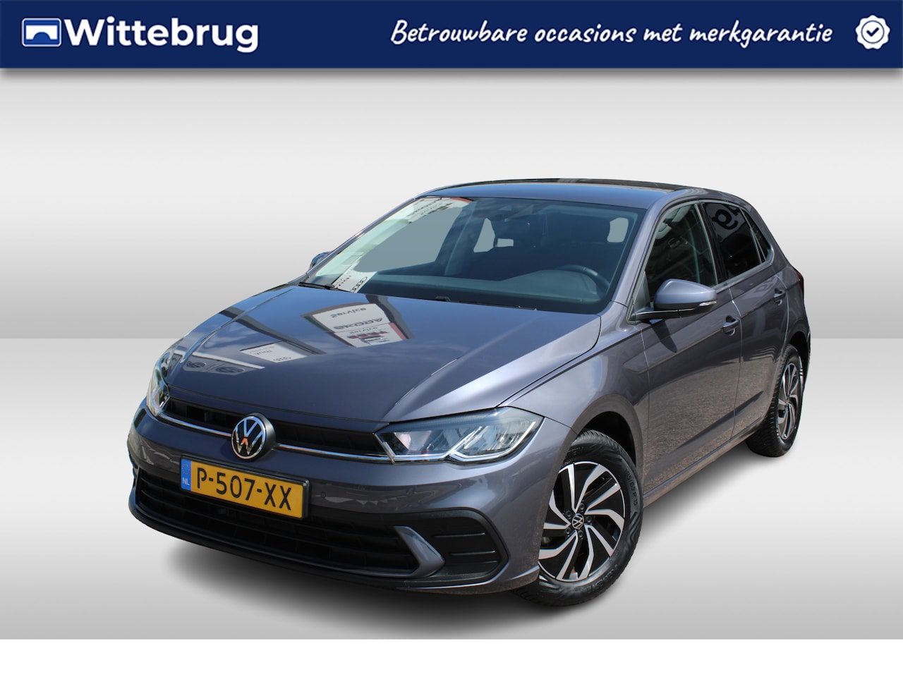 Volkswagen Polo - 1.0 TSI 95pk Life / Navigatie by APP / LM 15 inch / Parkeersensoren / LED Lage km stand!! - AutoWereld.nl