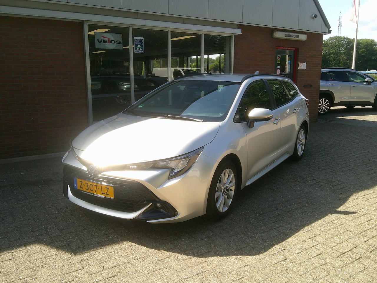 Toyota Corolla Touring Sports - Hybrid 140 Active - AutoWereld.nl