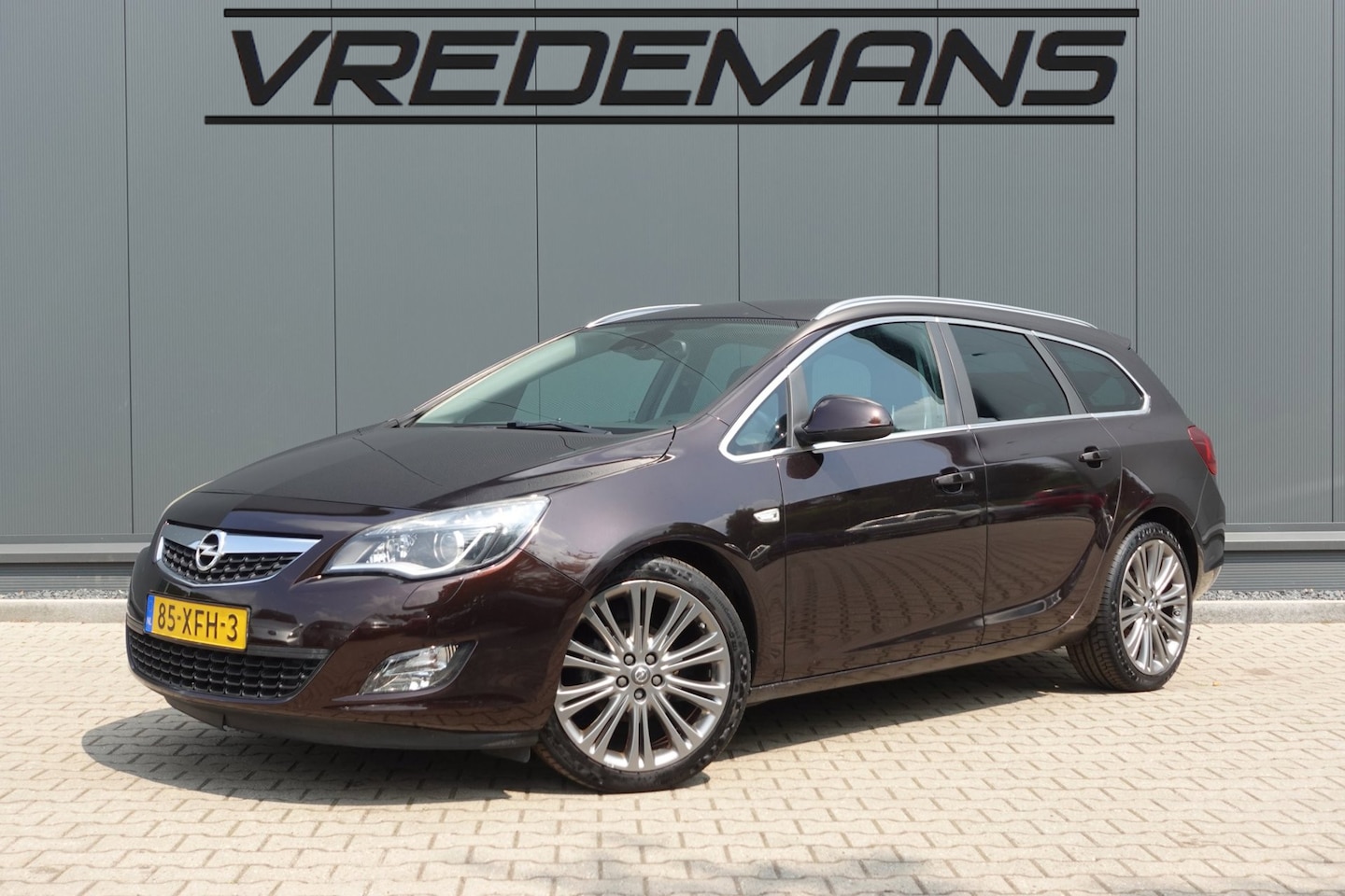 Opel Astra Sports Tourer - 1.4 Turbo Cosmo LEDER/NAVI - AutoWereld.nl