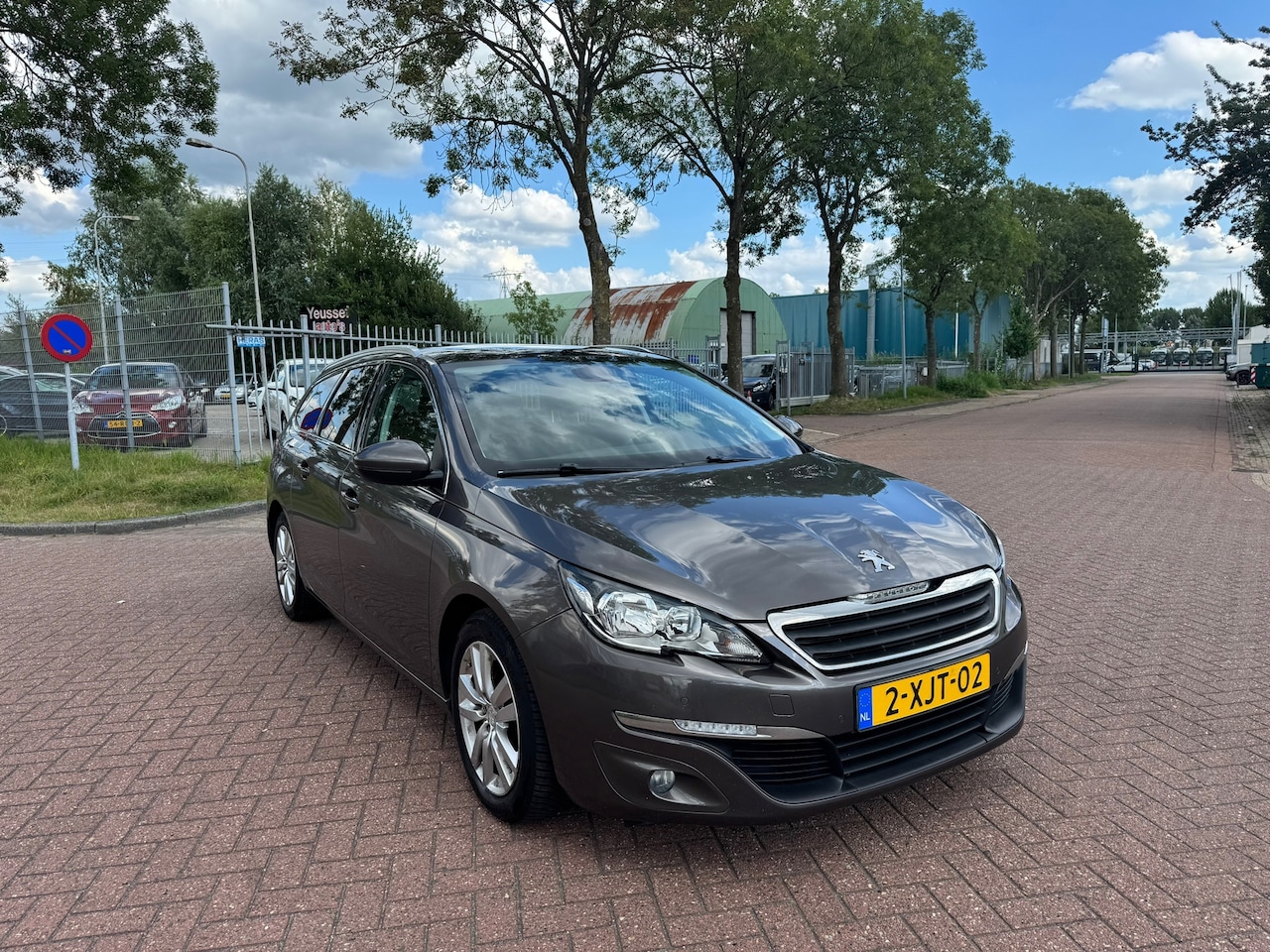 Peugeot 308 SW - 1.6 BlueHDI Blue Lease panorama - AutoWereld.nl