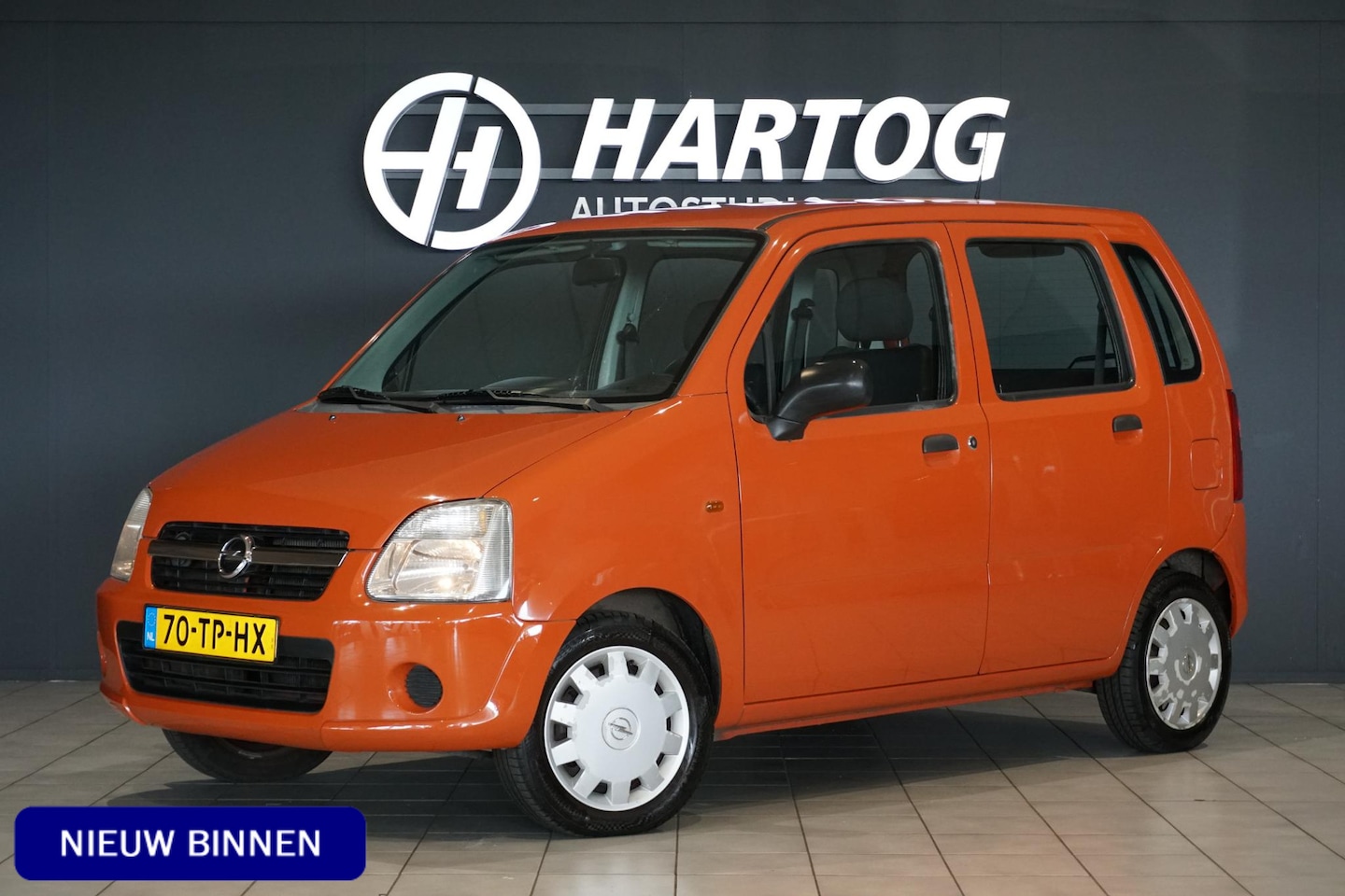 Opel Agila - 1.0-12V Essentia *EERSTE EIGENAAR* + DEALER ONDERHOUDEN / TERRA COTTA RED - AutoWereld.nl