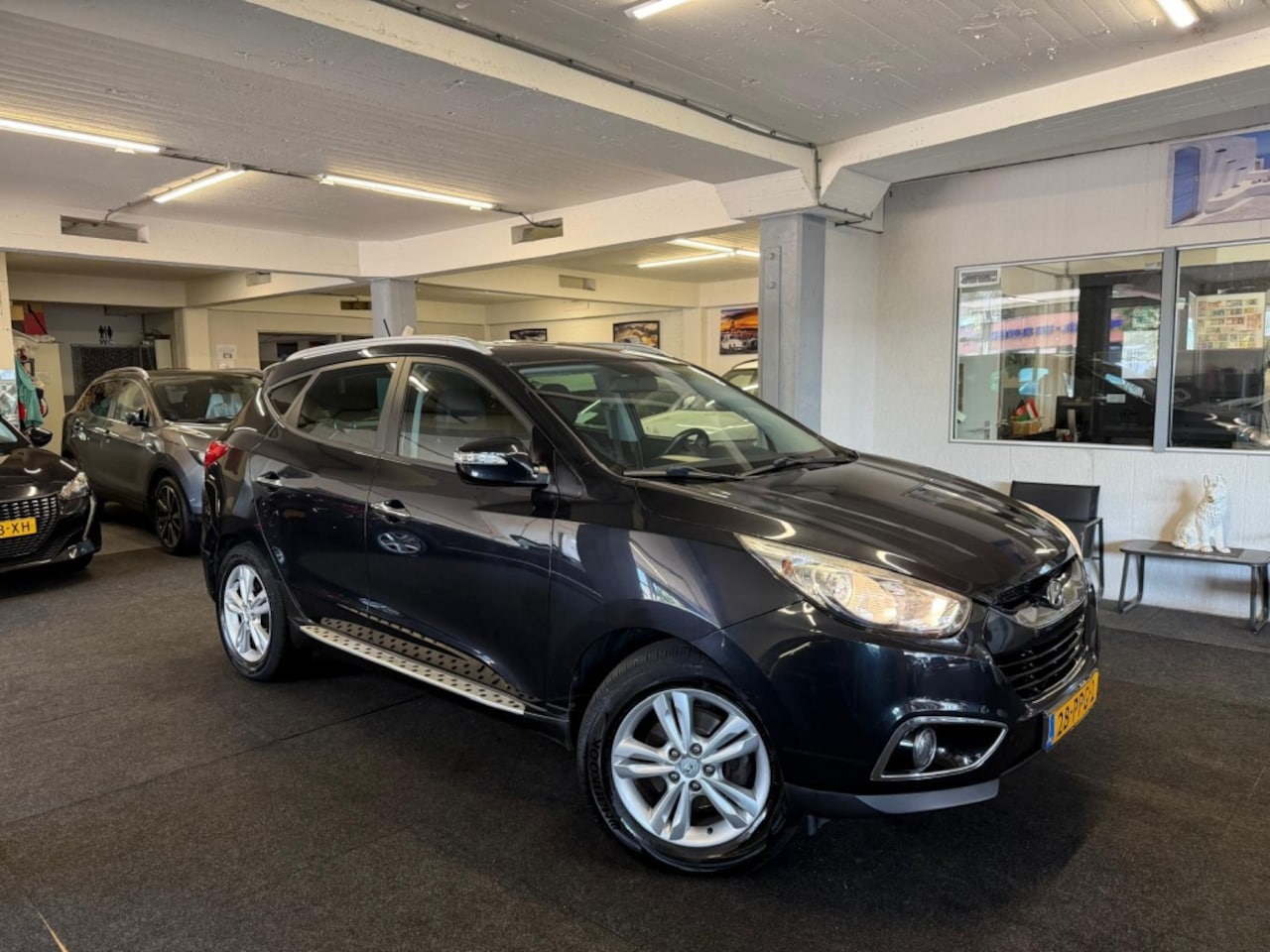 Hyundai ix35 - 1.6i GDI*Leder*Navi*NAP*Velgen - AutoWereld.nl