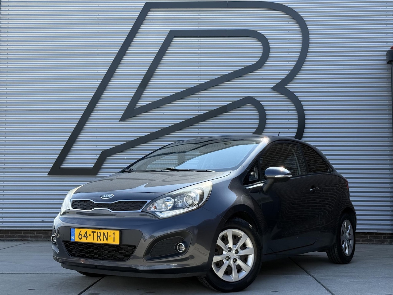 Kia Rio - 1.2 CVVT Plus Pack 1e Eigenaar|Airco|Elek Ramen|N.A.P.|APK tot 04-2027 - AutoWereld.nl