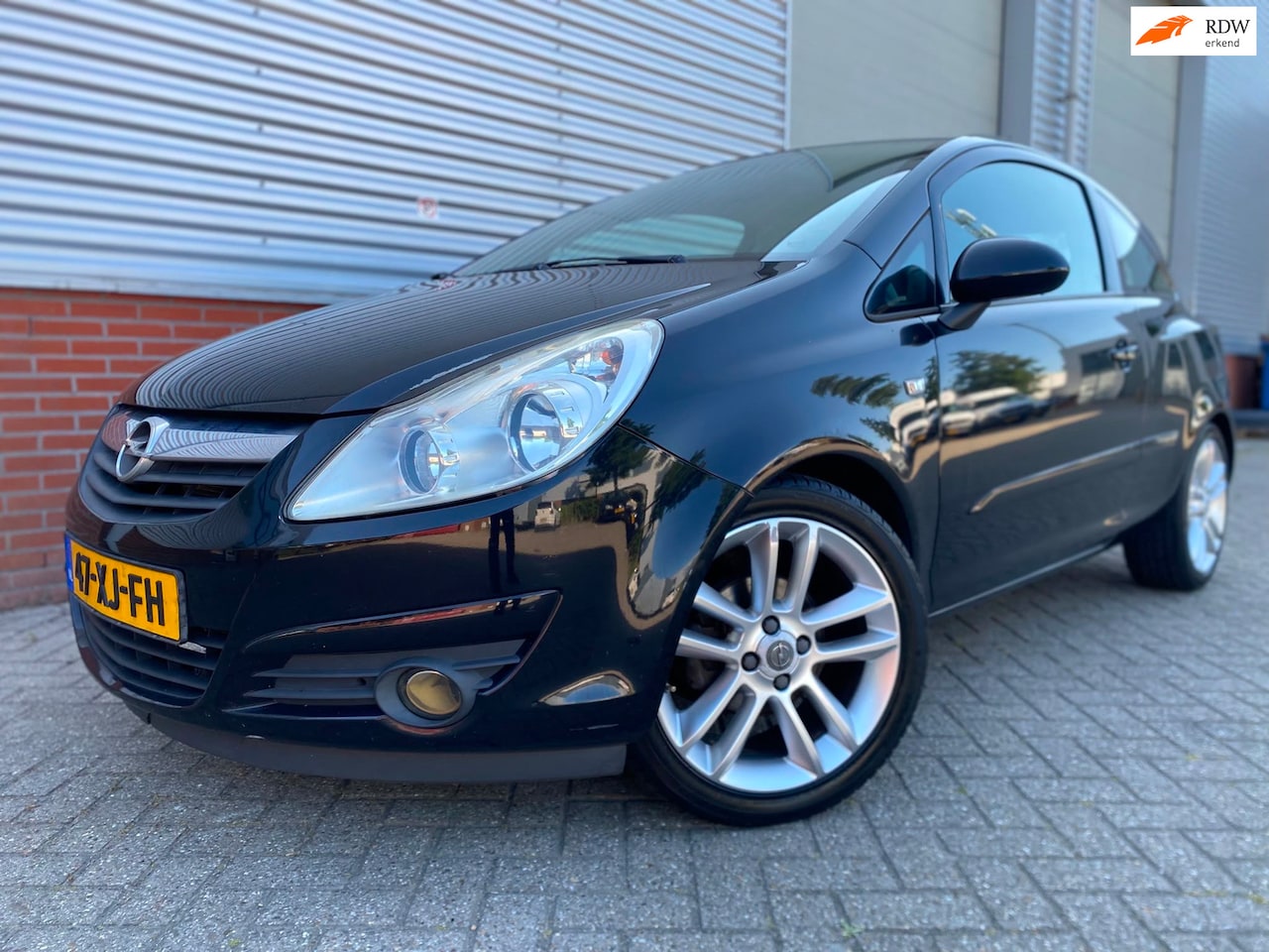 Opel Corsa - 1.2-16V Enjoy Airco - AutoWereld.nl