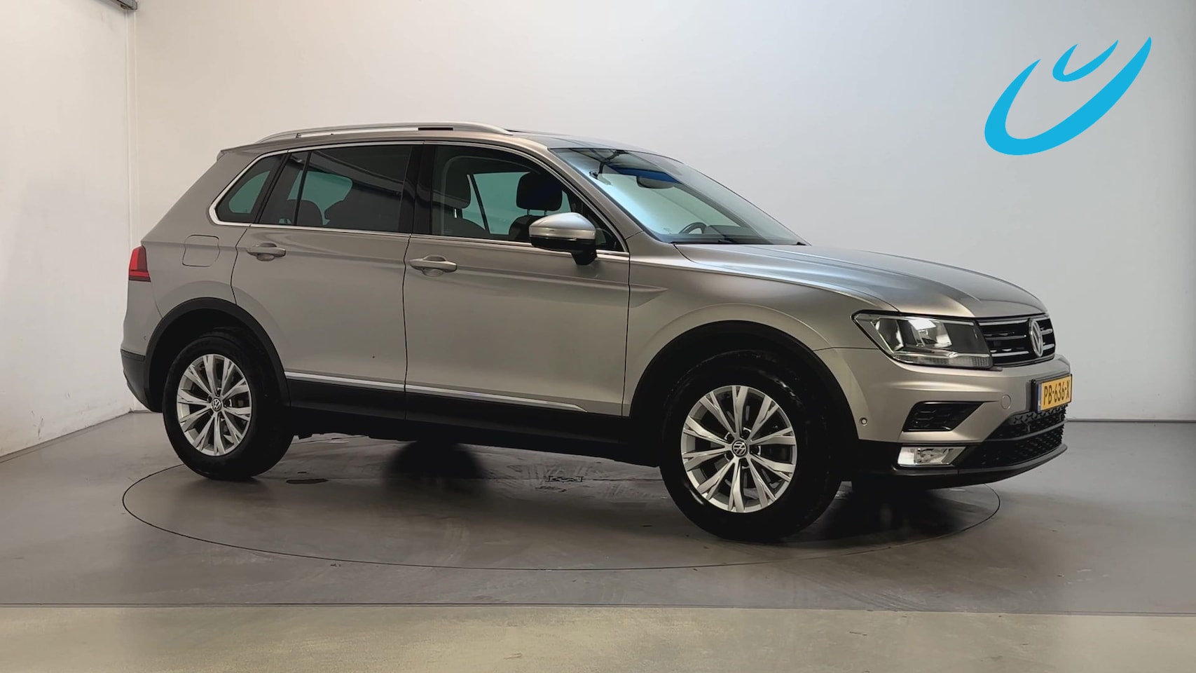 Volkswagen Tiguan - 1.4 TSI 150pk DSG ACT Comfortline Business Panoramadak Navigatie Alcantara Stoelverwarming - AutoWereld.nl
