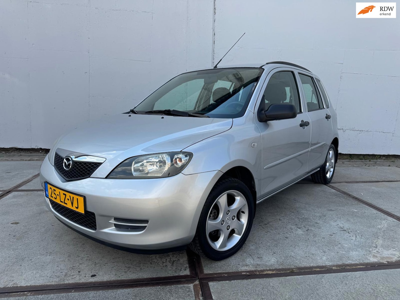 Mazda 2 - 1.4 Exclusive Airco - isofix - Lm velgen - NAP - 2e eigenaar - hoge instap - AutoWereld.nl